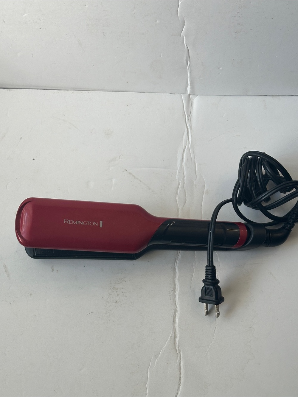 Remington Handheld Hair Straightener with Blue Backlit Display - Black and Red.